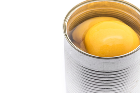 Peach fruit in silver can for sweet dessertの写真素材