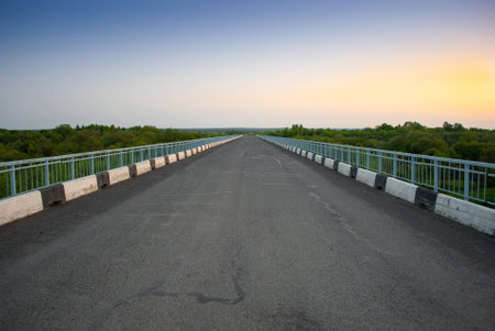 Bridge leaving to the horizonの写真素材