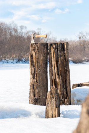 Old rotten wooden supports of the bridgeの写真素材