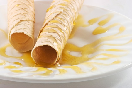 Luxury cookies with honey on plateの写真素材