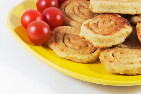 Detail of potato delicacies with tomatoesの写真素材