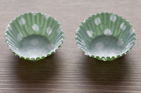 Two empty cups for cupcakesの写真素材