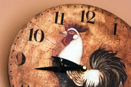 Retro wall clock with a rooster theme.の写真素材