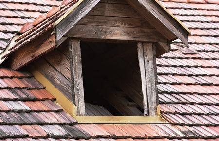 Antique roof window to the attic.