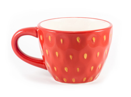 Red cup of tea on a white background.の写真素材