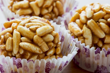 Close up of caramel puffed rice balls.の写真素材