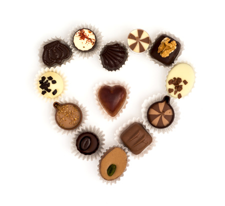 Valentine's heart made of delicious chocolate pralines.の写真素材