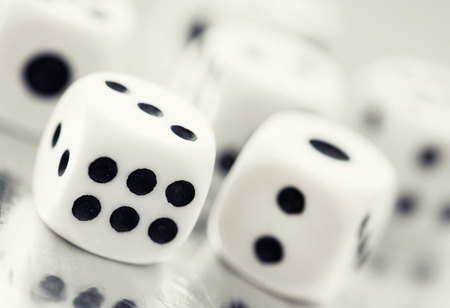 Casino dices on a reflective table.の写真素材