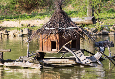 Box for waterfowl nesting on the water. Beauty in nature.の写真素材