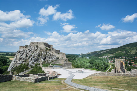 Famous castle Devin near Bratislava, Slovak republic, Central Europe. Cloudy sky and surrounding landscape.のeditorial素材