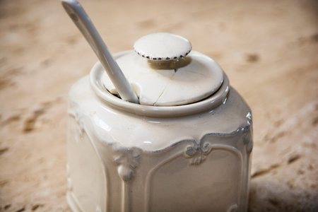Cracked ceramic sugar bowl. Retro style.の写真素材