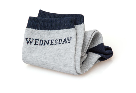 Trendy wool socks with inscription WEDNESDAY isolated on a white background.の写真素材