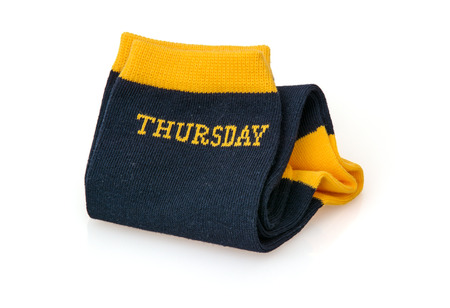Trendy wool socks with inscription THURSDAY isolated on a white background.の写真素材