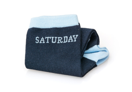 Trendy wool socks with inscription SATURDAY isolated on a white background.の写真素材