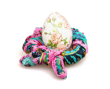 Big Easter egg and colorful scarf on the white background. Spring time.の写真素材