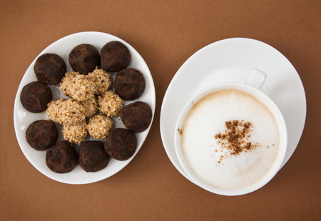 Chocolate truffles and tasty coffee. Food and drink.の写真素材