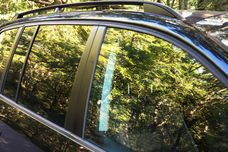 Beautiful natural scene reflected on the car.の写真素材