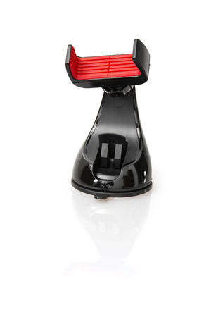 Mobile phone holder with reflection on the white background.の写真素材