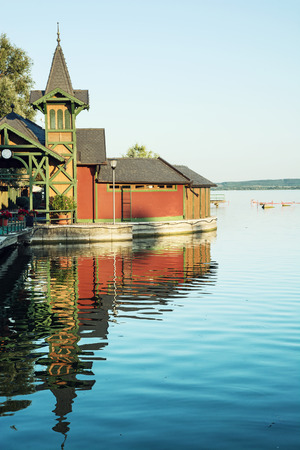 View from the beach pier of Keszthely at Lake Balaton by sunset. Picture of mirroring water level. Hungary.のeditorial素材