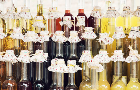Bottles of alcoholic beverage made from honey with different flavor.