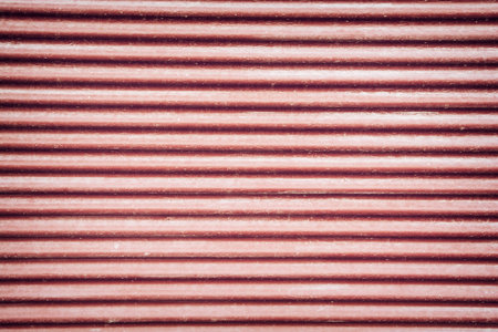 Red corrugated metal sheet texture background. Horizontal stripes.