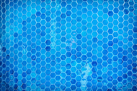 Blue mosaic swimming pool background. Summer vacation.の写真素材