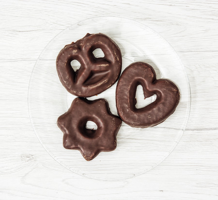 Tasty gingerbread cookies on the retro background. Christmas symbol. Sweet food theme.の写真素材