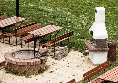 Garden restaurant with the stone grill. Summer activity.の写真素材