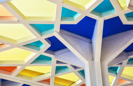 Futuristic colorful geometric ceiling on the exhibition.の写真素材