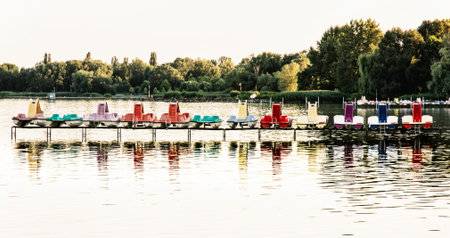 Colorful water bikes on the Balaton lake. Summer holiday.
