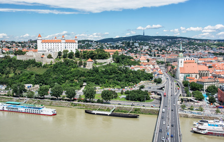 Bratislava is the capital city of Slovak republic. Beautiful castle, Saint Martin's cathedral, bridge SNP, Danube river and Kamzik TV Tower. Architectural theme. Travel destination. Cultural heritage.の写真素材
