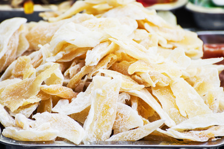 Dried sliced pineapple on the market place. Citrus fruits. Food theme. Healthy food.の写真素材