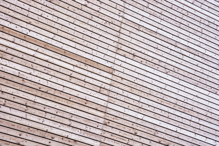 Background of geometric wooden texture. Building material. Abstract graphic resource.の写真素材