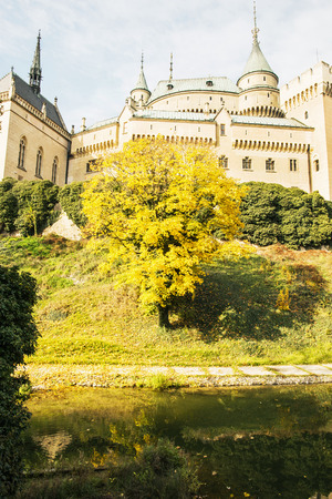Bojnice castle in Slovak republic. Yellow autumn trees. Cultural heritage. Seasonal scene. Beautiful place. Vibrant colors.のeditorial素材