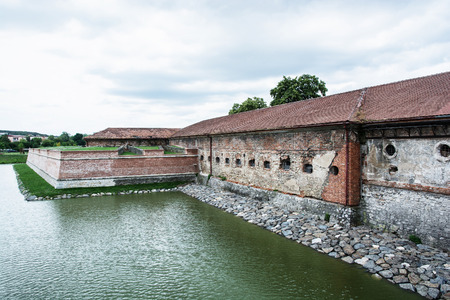Old castle with moat in Holic, Slovak republic. Cultural heritage. Architectural theme. Historical object.のeditorial素材