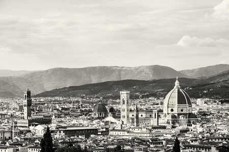 Florence is the capital city of the Italian region of Tuscany and of the province of Florence. Beautiful historic urban landscape. Black and white photo.の写真素材