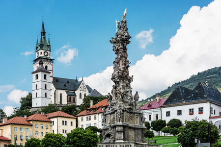 Saint Catherine's church and Plague column in Kremnica city, Slovak republic. Architectural theme. Travel destination.の写真素材
