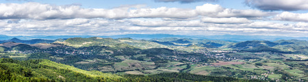 View from the Sitno hill to Stiavnica mountains, Slovak republic. Panoramic seasonal natural scene. Autumn country.の写真素材