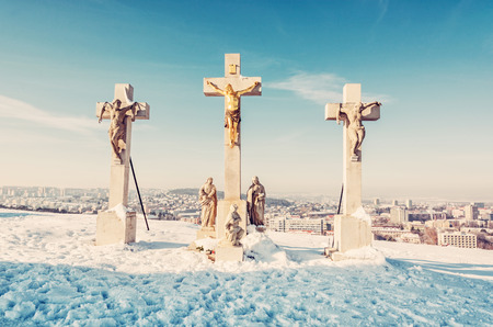 Calvary in Nitra city, Slovak republic. Religious place. Winter scene. Cultural heritage. Travel destination. Snow and sunny. Beauty photo filter.の写真素材