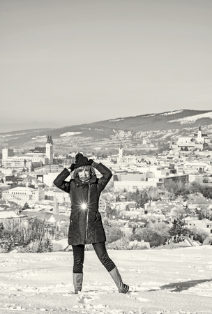 Positive woman posing in snowy landscape, Nitra, Slovak republic. Winter scene. Black and white photo.の写真素材
