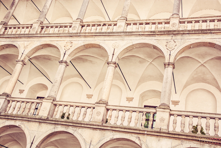 Close up photo of gothic castle of Jindrichuv Hradec, Czech republic. Architectural scene. Travel destination. Wall with columns. Old photo filter.のeditorial素材