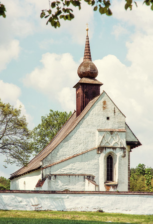 Chapel of Our Mother God near Veveri castle, Moravia, Czech republic. Travel destination. Religious architecture. Yellow photo filter.の写真素材