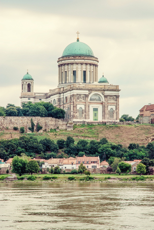 Beautiful basilica and Danube river in Esztergom, Hungary. Cultural heritage. Travel destination. Place of worship. Religious architecture. Old photo filter.の写真素材