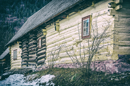 Yellow wooden house in Vlkolinec village, Slovak republic. Cultural heritage. Travel destination. Folk architecture.の写真素材