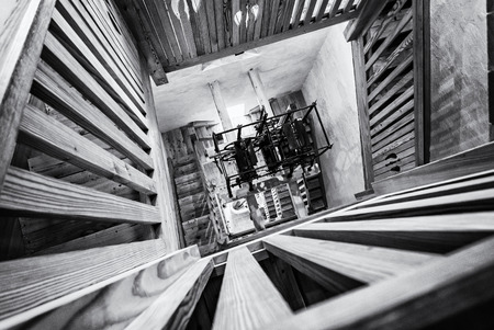 Inner staircase in tower, St. George's Parish church, Piran, Slovenia. Architectural theme. Religious architecture. Black and white photo.の写真素材