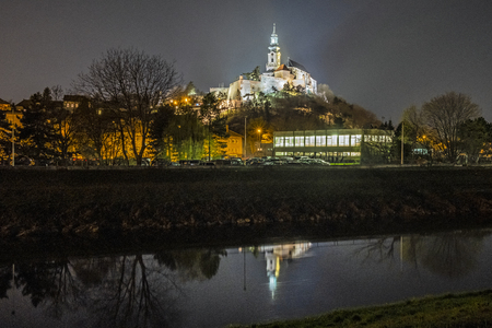 Ancient castle is mirrored in river, Nitra, Slovak republic. Night scene. Cultural heritage. Architectural theme.のeditorial素材