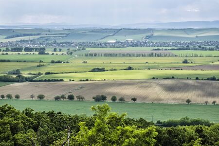 Landscape with fields from Oponice castle ruins, Slovak republic. Seasonal natural scene. Travel destination.の写真素材