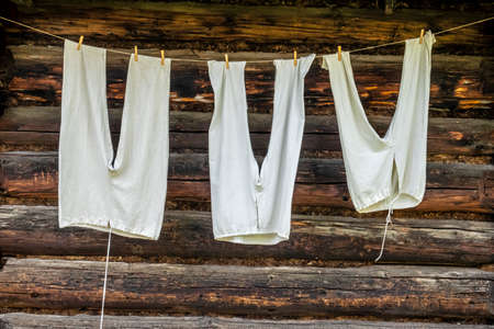 Clothes drying theme. Detail photo of rural life.の写真素材