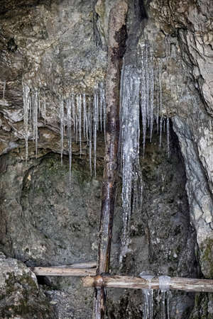 Big icicles in the cave, Low Tatras, Slovak republic. Hiking theme.の写真素材