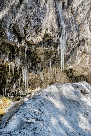 Big icicles on the rock, Poludnica hill, Low Tatras, Slovak republic. Hiking theme. Seasonal natural scene.の写真素材